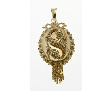 Gold regional pendant, 585/000, oval model with S-shaped element. The pendant has a beard. approximately 3.8 grams. 5 cm. In 