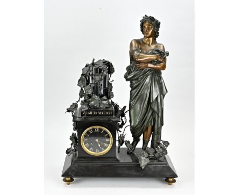 Antique, French, black marble with composition metal mantel clock, with large figures and column with climbing plant. Circa 1
