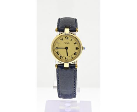 Must de Cartier watch, lady, silver gold plated, 925/000, Quarts. Round model with a gold-colored dial. Equipped with a blue 