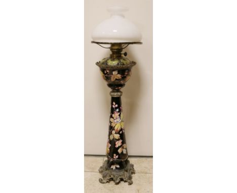 Antique high standing majolica table lamp with floral decor. Circa 1900. Majolica intact. Reservoir + glass shade is missing.