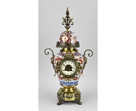 Antique French brass mantel clock with Imari porcelain and fratzen. Eight-day movement, half-hourly striking, spring pendulum