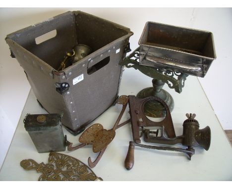 Brass trivet stand, a selection of old mincers, brass ware, vintage roller skates etc 
