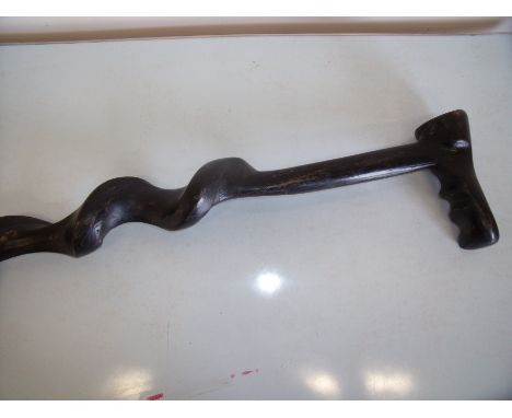 An unusual twisted and ebonised wood walking stick (91cm)