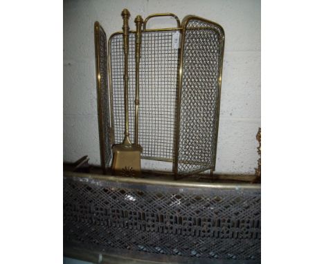 19th/20th C pierced work brass fire fender (width 125cm), a Edwardian brass three fold and meshwork fire screen and a brass c