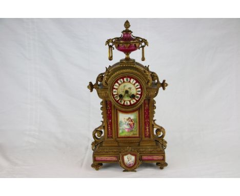 A French Ormolu Mantle Clock with Scarlet Sevres Plaques c 1880