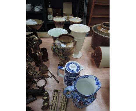 Seven ceramic vases and jugs including Royal Doulton and Wedgewood