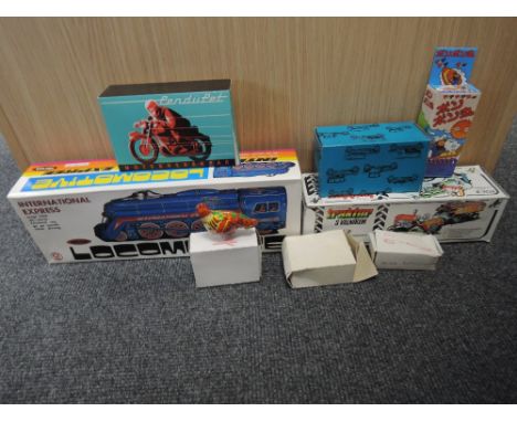 A selection of modern  tin plate and clockwork toys including Kov4p Traktor, Pendupet Motorkerekpar, MFPF Locomotive  etc all