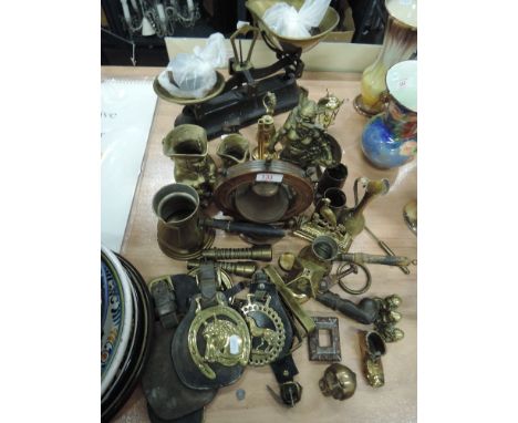 A selection of brass ware including door knocker and kitchen scales etc