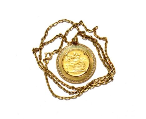 A Victorian full sovereign dated 1875 mounted as a pendant on a yellow metal chain, pendant loop stamped '375', chain clasp a