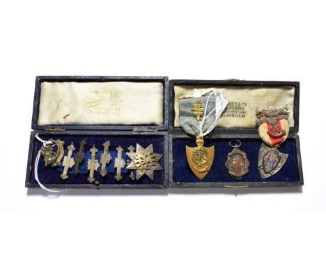 Order of the shield 15 carat gold medal; silver attendance ribbon medal, June 1926; silver and enamel ribbon medal; and a sil