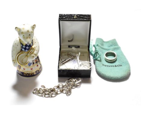 A Tiffany &amp; Co silver band ring, finger size N; a pendant on chain; a Links of London silver bracelet; and a Royal Crown 