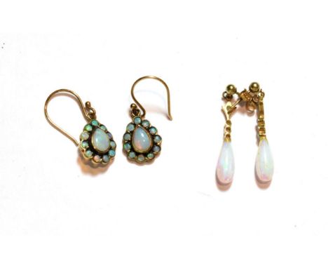 A pair of opal cluster drop earrings, stamped '375', with hook fittings; and a pair of opal drop earrings, stamped '375', wit