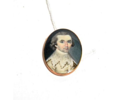 English School (mid 18th century) Portrait of a man with dark hair, wearing a buff coat and 'Van Dyck' collar, oval, 3.2cm 