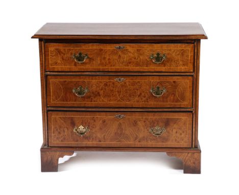 A Burr Walnut and Boxwood Strung Chest of Drawers, 20th century, in 17th century style, with moulded top above three graduate