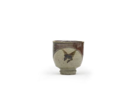 HAMADA SHOJI (1894-1978)A Stoneware Tea Bowl Showa era (1926-1989), mid-20th centurySlightly tapered and set on a high foot, 