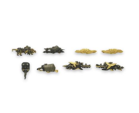 FOUR SETS OF MENUKI (HILT GRIPS)Edo period (1615-1868), 18th and 19th centuryThe first gold, as wisteria leaves and blossoms;