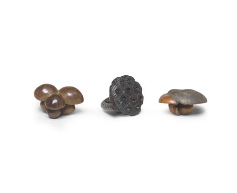 THREE WOOD NETSUKEEdo period (1615-1868) to Meiji era (1868-1912), 19th centuryThe first a cluster of three round capped mush