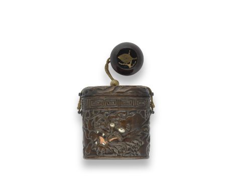 A CARVED WOOD TONKOTSU (TOBACCO POUCH)Edo period (1615-1868), probably 19th centuryThe body carved in varying degrees of reli