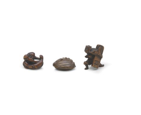 THREE WOOD NETSUKEEdo period (1615-1868), 19th centuryThe first the Chinese hero Yojo (Chinese: Yu Rang) seated, stabbing the