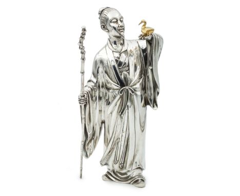 OSHIMA JOUN (1858-1940)A Silver Okimono (Table Ornament) of a Sennin or Scholar Meiji (1868-1912) or Taisho (1912-1926) era, 