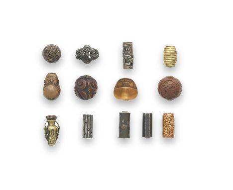 A GROUP OF 53 ASSORTED OJIME (FASTENERS)Edo period (1615-1868) to Meiji era (1868-1912), mid-19th to early 20th centuryCompri