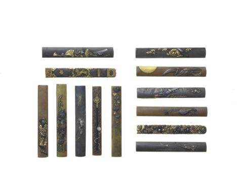 THIRTEEN KOZUKA (KNIFE HANDLES)Edo period (1615-1868), 18th to 19th centuryAll chiselled and inlaid with gold, silver, shakud