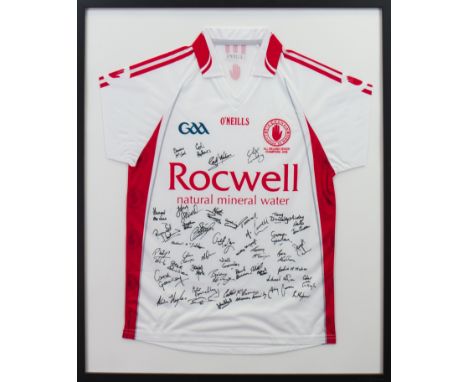 AUTOGRAPHED TYRONE GAA GAELIC FOOTBALL SHIRTsigned by players and staff including Niall Gormley, Martin Penrose, and Tony Don