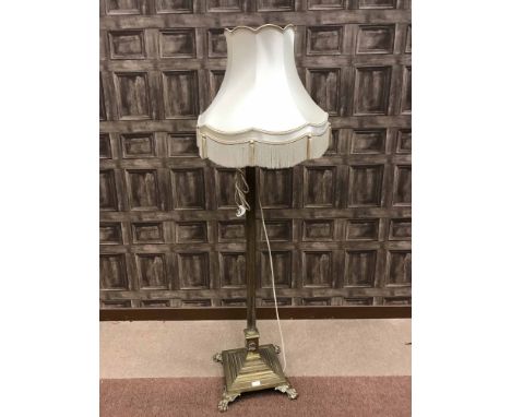 EDWARDIAN BRASS CORINTHIAN PILLAR FLOOR LAMP on a stepped base with paw feet, 122 cm high