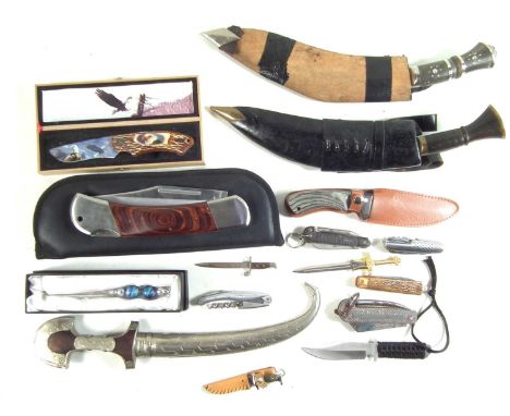 Collection of sixteen knives including a shop display lock knife stamped Jaguar, also Army issue pen knives, two Kukris etc.