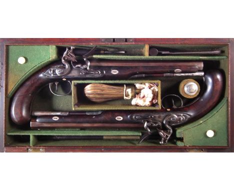 Matched pair of Flintlock duelling pistols by Wogdon and Barton London, with 28 bore 10 inch octagonal barrels fitted with si