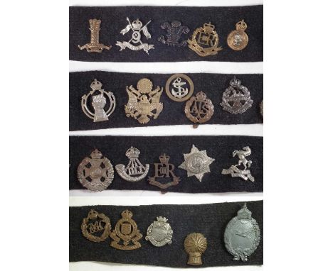 Twenty cap badges, mainly British army, but includes a Imperial German Prussian Aviator Navy Badge probably of later period b