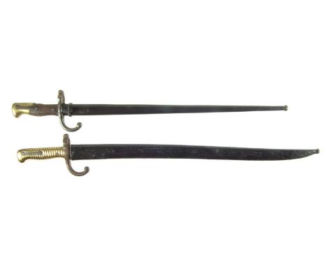 Chassepot M1866 bayonet and scabbard, also a Gras rifle pattern M1874 bayonet with scabbard.The largest measures 71cm long