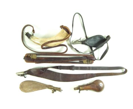 Five shot / powder flasks, three stamped with makers Dixon, C&amp;J.W. Hawksley, and Sykes Extra, the horn flask stamped Arno