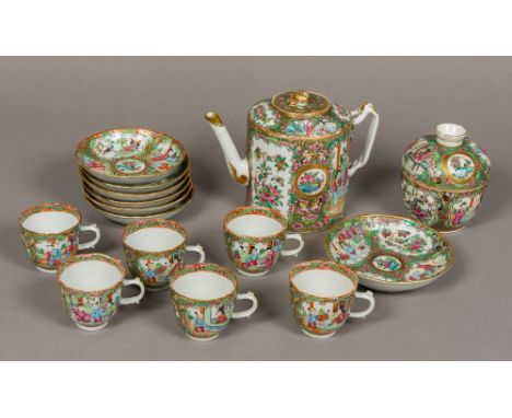 A 19th century Canton famille rose tea setTypically decorated, comprising: teapot, six teacups and saucers and a sugar bowl a