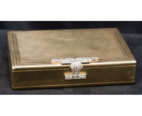 A Cartier 9 ct gold and diamond snuff box, stamped 375, maker's mark of JC (Jacques Cartier)Of hinged rectangular form, with 