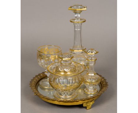 A 19th century gilt decorated cut glass bachelor's decanter set and trayComprising: decanter and stopper, single rummer, ice 