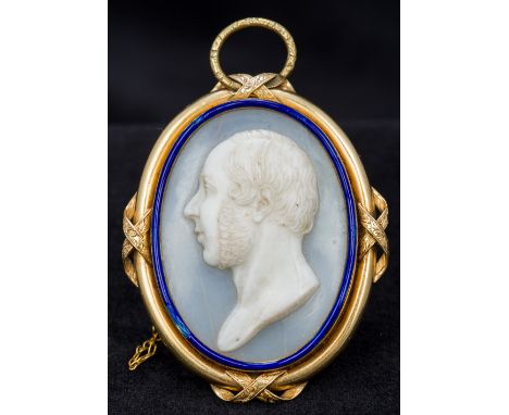 A finely worked portrait cameo of a bearded gentlemanMounted in an unmarked gold frame with brooch and pendant fittings, the 