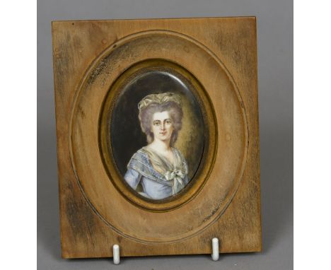 CONTINENTAL SCHOOL (19th century) Portrait miniature of a Young LadyWatercolours, possibly on ivory, signed Aubert, framed an