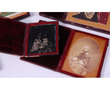 *A Victorian daguerreotype three-quarter portrait of a young girl, in fitted leather case, with hand-written annotation 'Edit