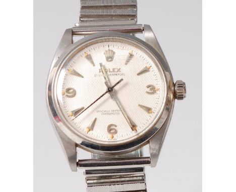 A gents Rolex steel cased Oyster Perpetual officially certified chronometer, having a signed silvered dial with quarter Arabi