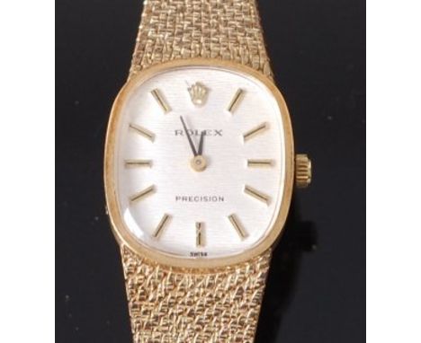 A ladies Rolex 14ct gold cased wristwatch, having signed silvered oval dial with baton markers, Rolex Precision manual wind m