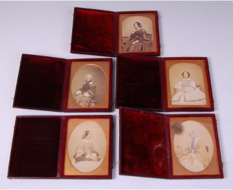 *A Victorian hand-coloured daguerreotype three-quarter length portrait of a lady, in fitted leather case, with hand-written a