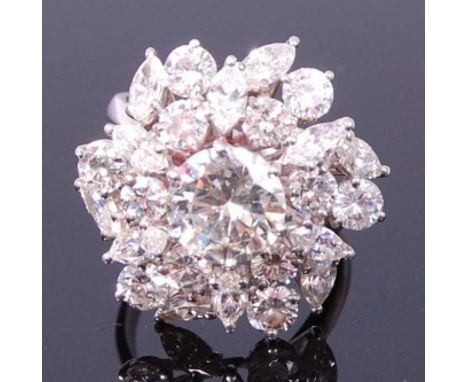 A ladies platinum and diamond set cocktail ring, arranged as a centre claw set brilliant weighing approx 1.6ct, within a surr