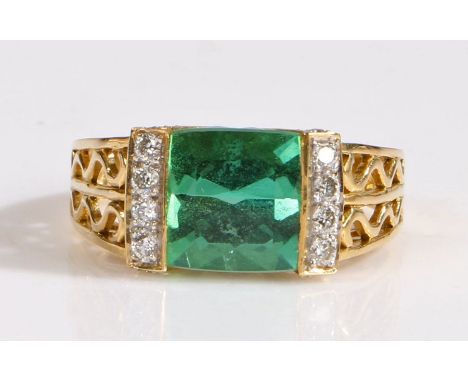 A 18 carat gold pirineu tourmaline and diamond ring, the head set with antique cushion cut pirineu tourmaline stone together 