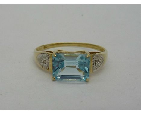 A 9ct gold, blue topaz and diamond ring, weight 1.6g, size O