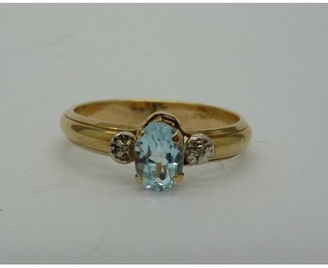 A 9ct gold and blue topaz ring, weight 1g, size M