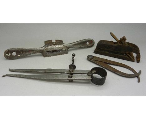 A small plane and three other tools