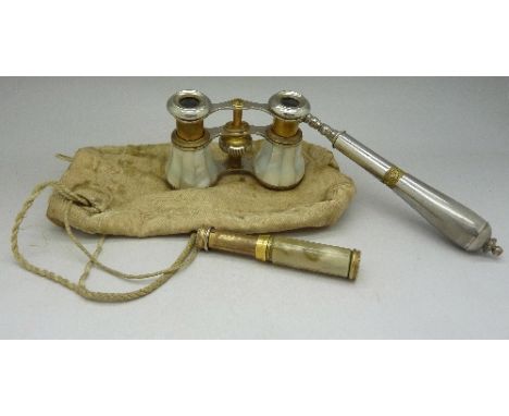 A pair of mother of pearl opera glasses and a scent spray
