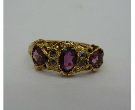 A Victorian 15ct gold, garnet and diamond ring, Birmingham 1868, weight 1.8g, size K