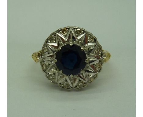 A c.1970's 18ct gold, sapphire and diamond cluster dress ring, weight 6.6g, size R